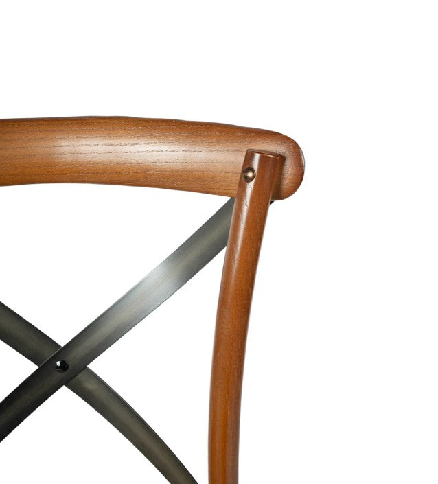 Close-up of a wooden chair armrest on a white background