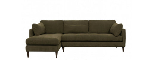 Deep green sectional sofa on a white background