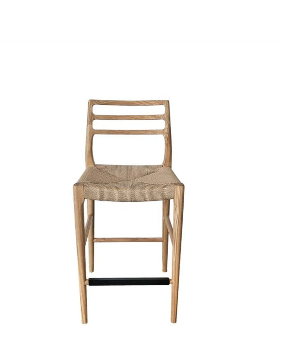 Wooden chair with woven seat on a white background