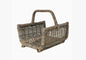 Wicker basket with handle on a white background