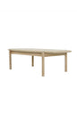 Wooden dining table on a white background