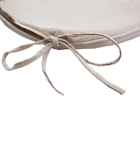 Beige cushion with a tied string on a white background